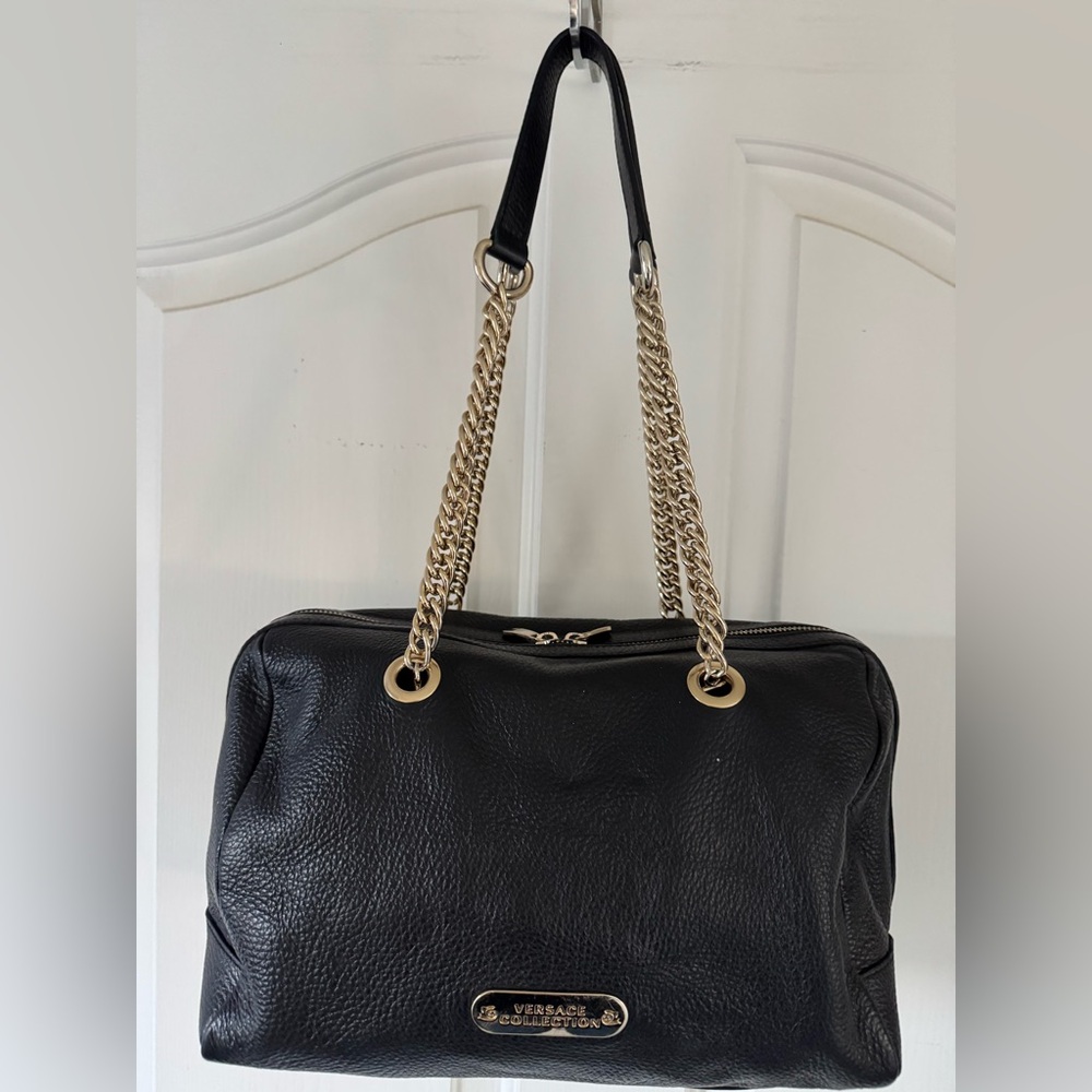 Versace Collection, soft black pebbled leather, gold hardware, zipper closure